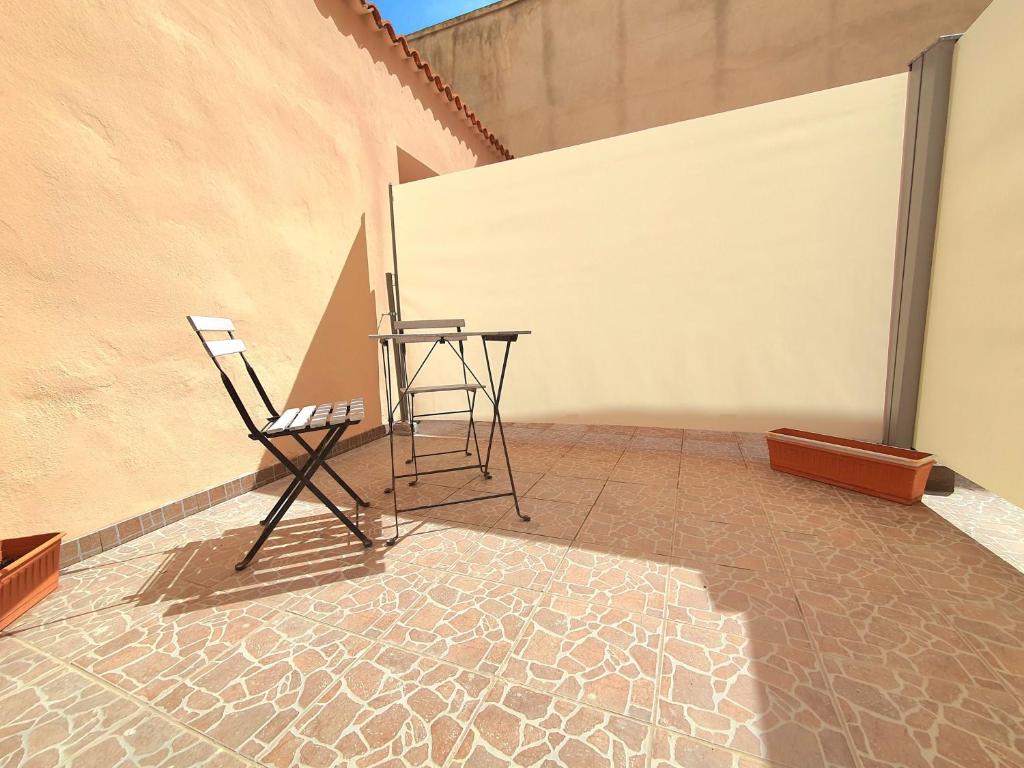 Patio alebo iná vonkajšia časť ubytovania Aba Maya Alghero