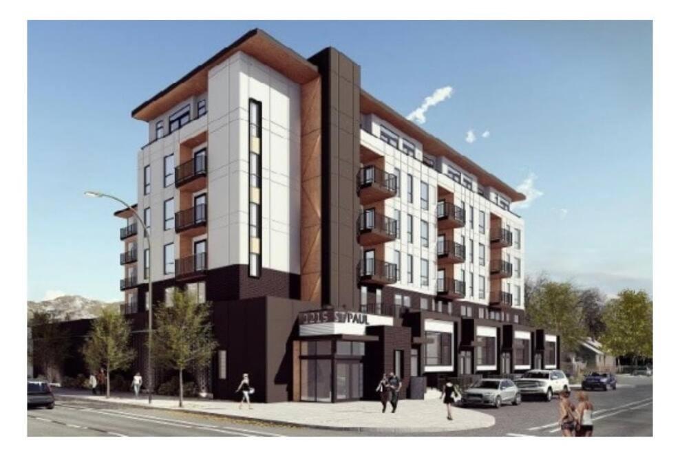 an architectural rendering of a building on a street at Spacious 2-bed, 2-bath condo in downtown Kelowna! in Kelowna