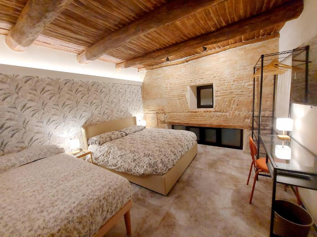 Postelja oz. postelje v sobi nastanitve Talismano Luxury Suite & Loft & Alcova