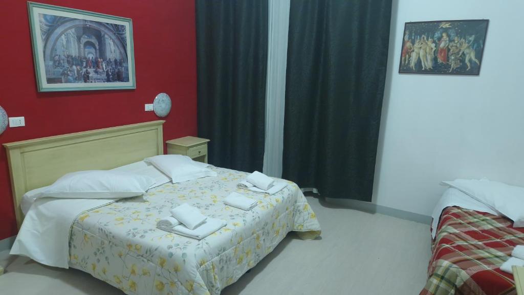 Postel nebo postele na pokoji v ubytování Hotel Genzianella