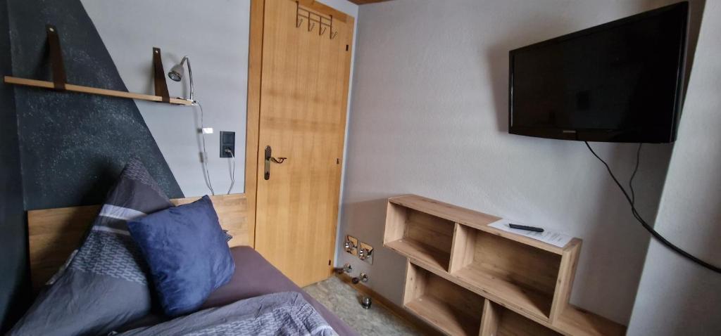 Televízia a/alebo spoločenská miestnosť v ubytovaní Appartement Gletscher-Koje