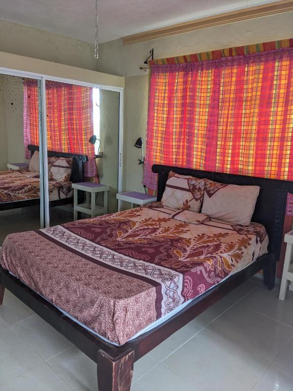 Postel nebo postele na pokoji v ubytování M & L Shared Apartment