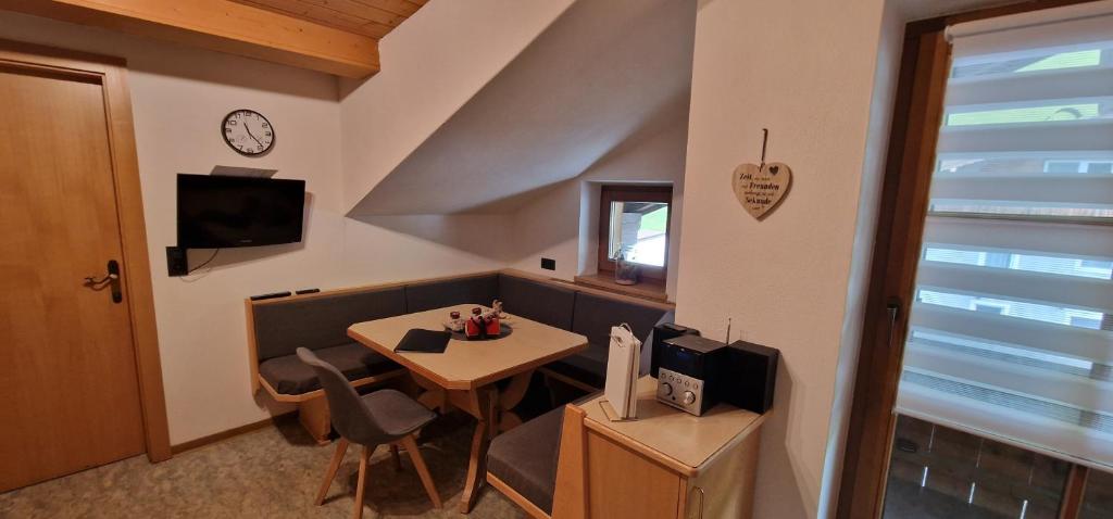 Televízia a/alebo spoločenská miestnosť v ubytovaní Appartement Gletscher-Koje