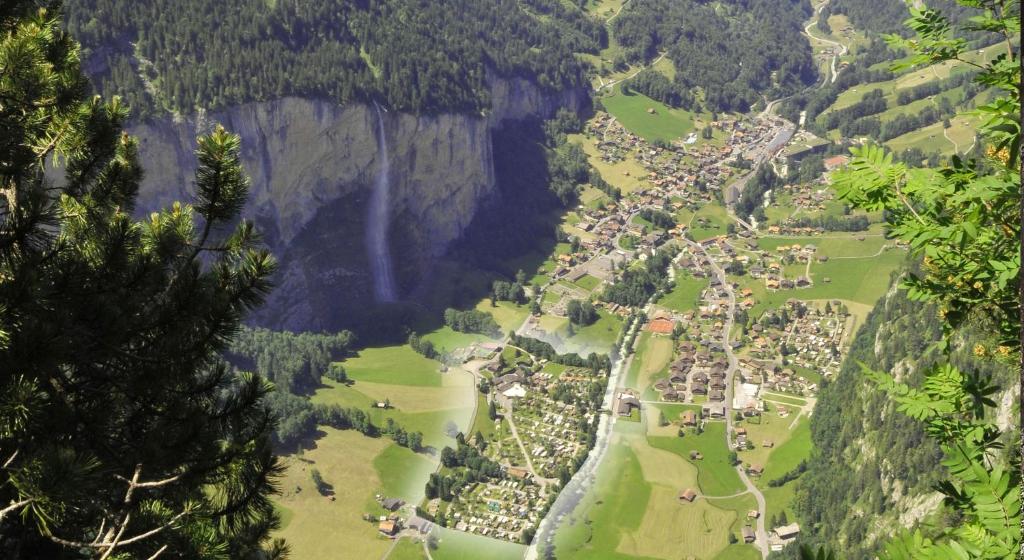an aerial view of a village in the mountains at Camping Jungfrau in Lauterbrunnen