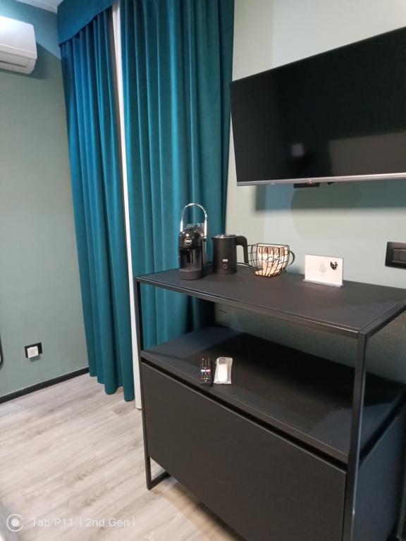 TV a/nebo společenská místnost v ubytování Blu room