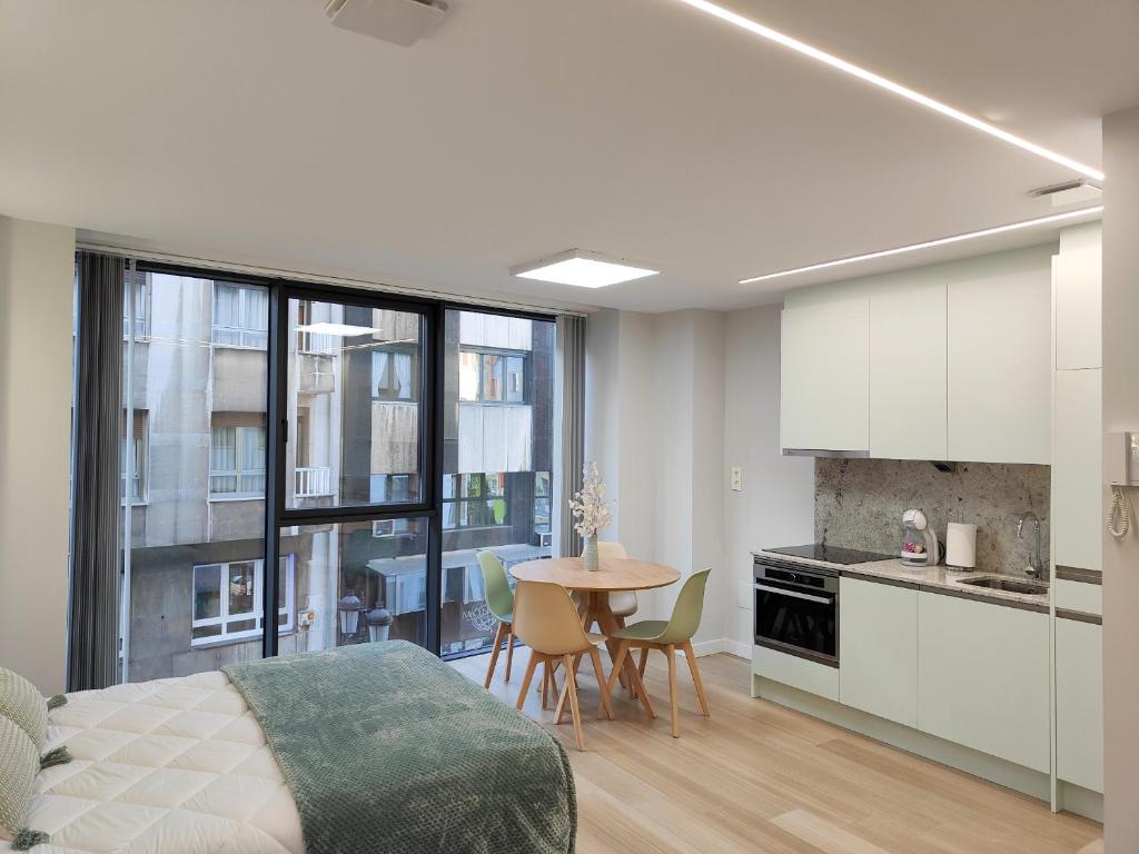 Kuchyň nebo kuchyňský kout v ubytování Apartamentos Centro Oviedo Caveda