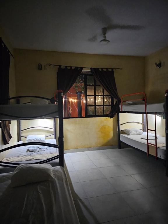 Una cama o camas en una habitación de Hostal La Ermita