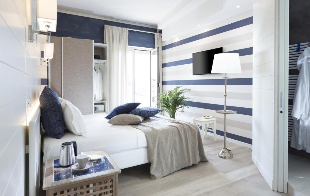 Postel nebo postele na pokoji v ubytování Hotel Atlantic Riviera Mare