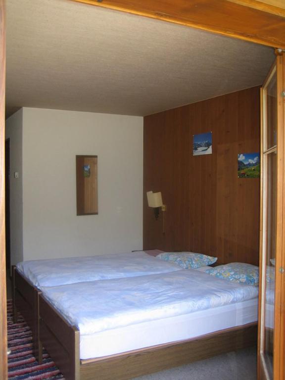 Ένα ή περισσότερα κρεβάτια σε δωμάτιο στο Hotel Elite B&B