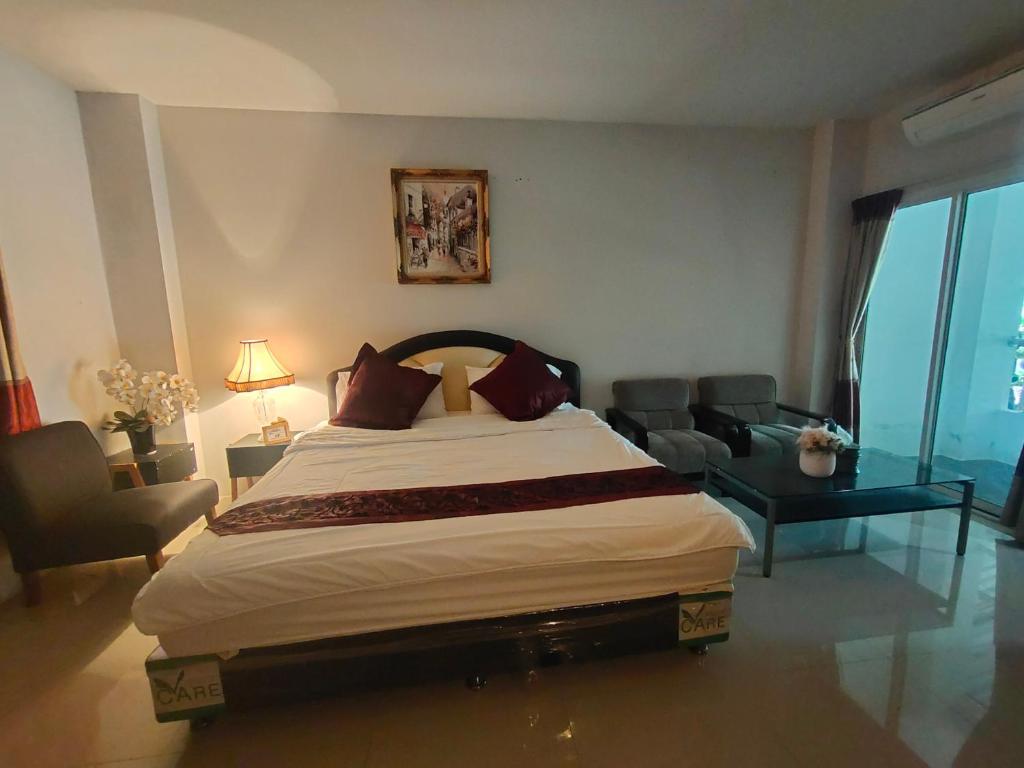 Postel nebo postele na pokoji v ubytování The rich room ห้องพักนครราชสีมาใกล้เซ็นทรัล