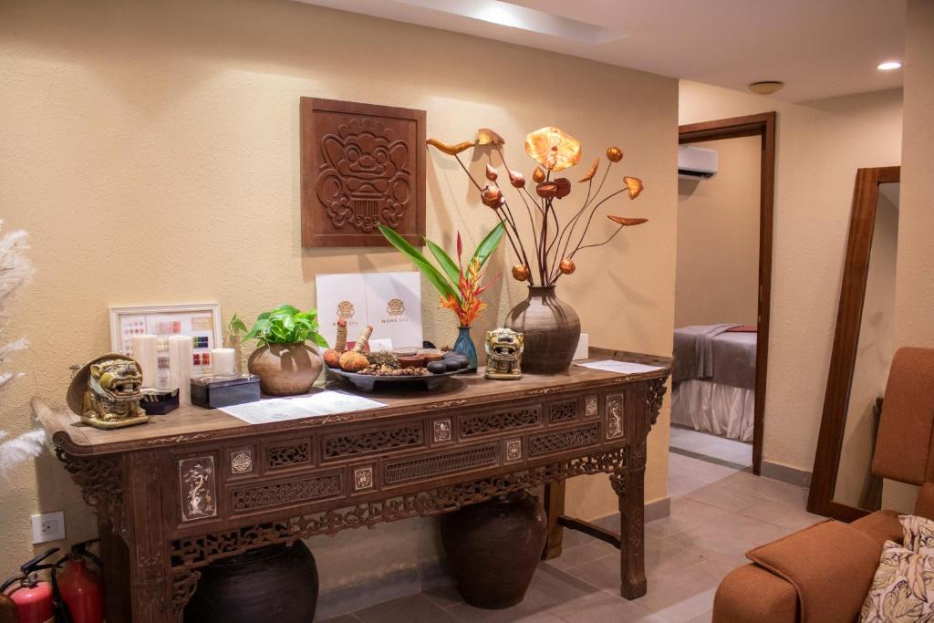 Posezení v ubytování Nghê Prana Hotel and Spa Hoi An