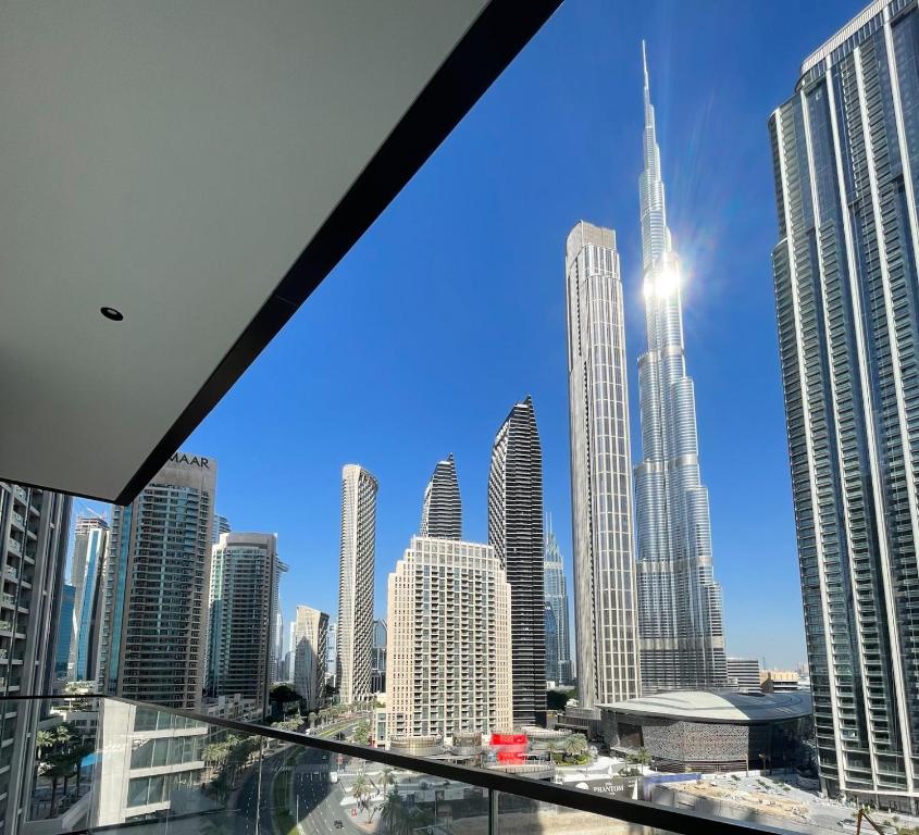 a view of a city skyline from a skyscraper at Amazing Burj and Opera View Apartment 163BC-2 in Dubai