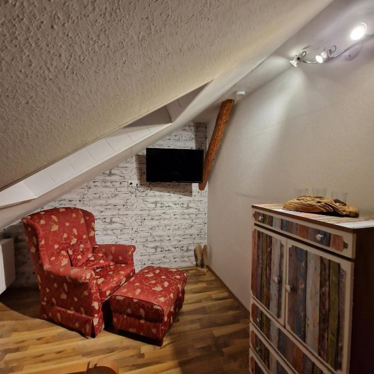 TV a/nebo společenská místnost v ubytování Bei Conny und Bernd