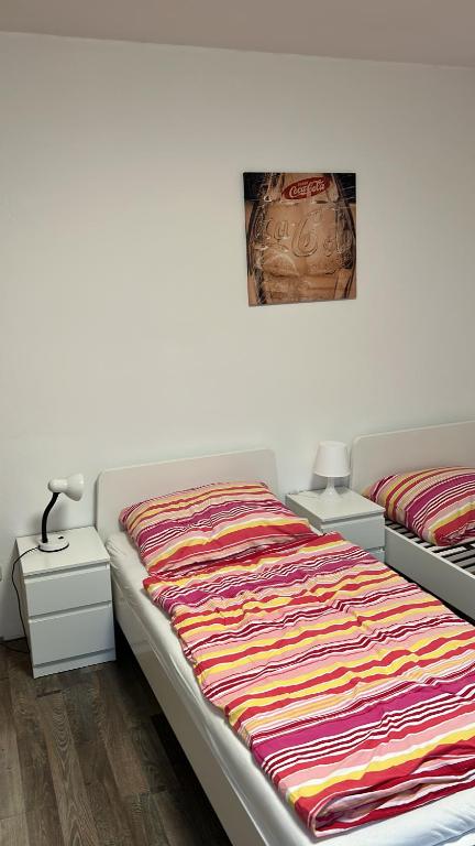 Postel nebo postele na pokoji v ubytování Heurigenbar