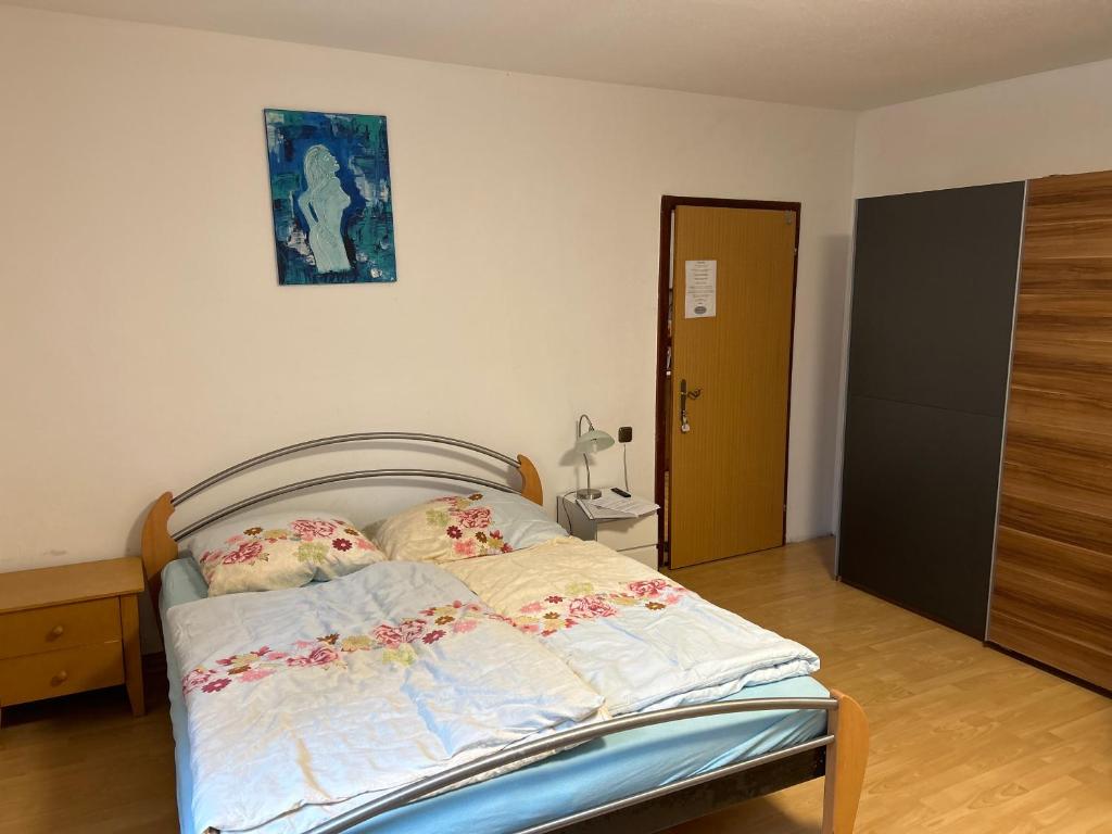 Postel nebo postele na pokoji v ubytování Heurigenbar