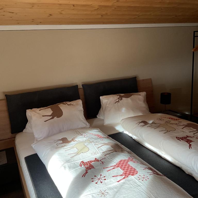 Postel nebo postele na pokoji v ubytování Haus Asslaber