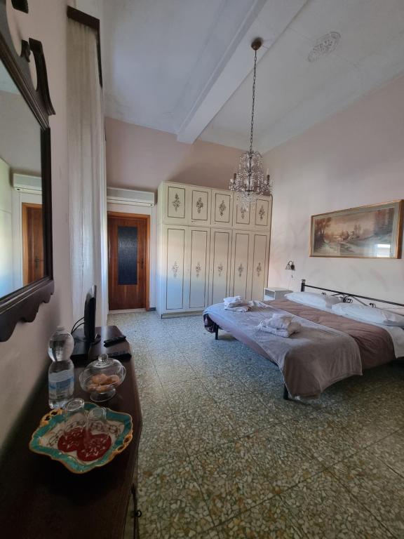 En eller flere senge i et værelse på ViaEmilia