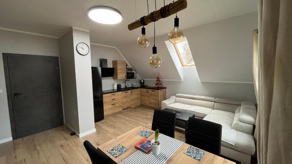 Kuchyňa alebo kuchynka v ubytovaní Apartamenty Czarna Perła