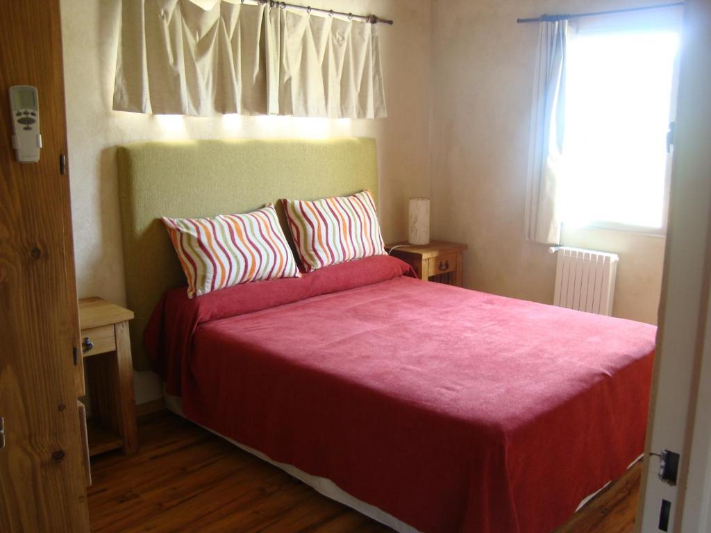 מיטה או מיטות בחדר ב-Cabañas del Espera N 65