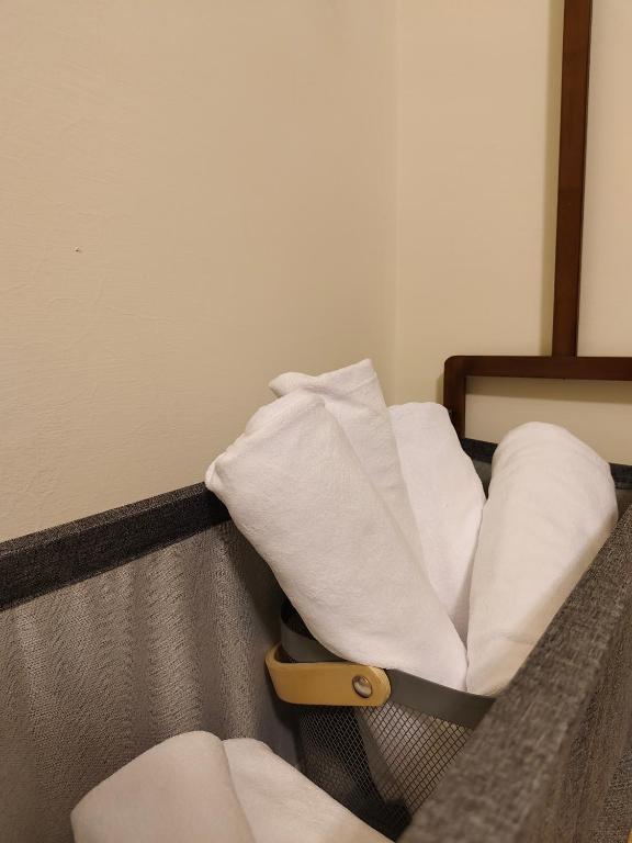 Postel nebo postele na pokoji v ubytování 小憩人輕旅