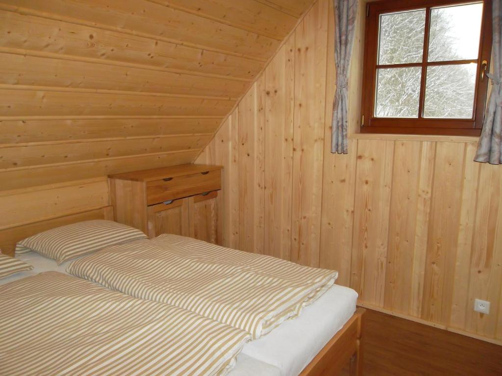 Postel nebo postele na pokoji v ubytování Chata Sipkova II