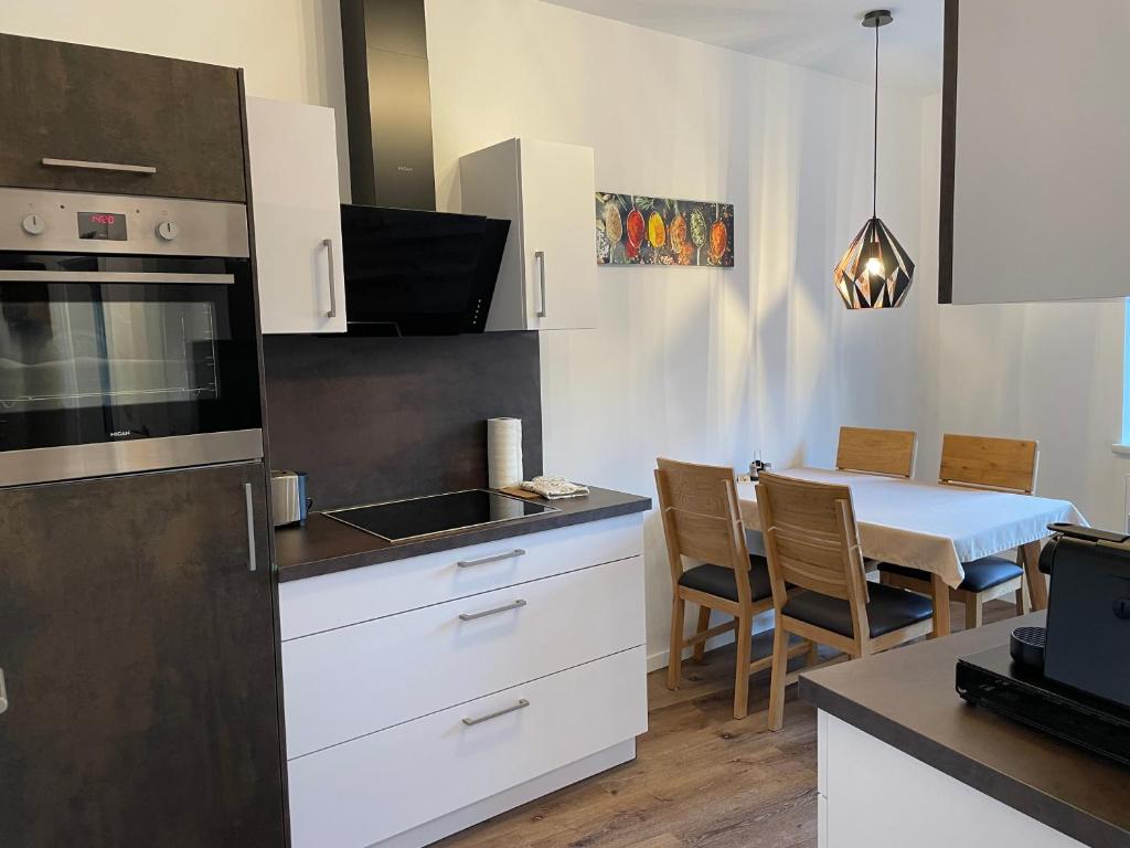 Kuchyň nebo kuchyňský kout v ubytování Apartments am Mühlbach