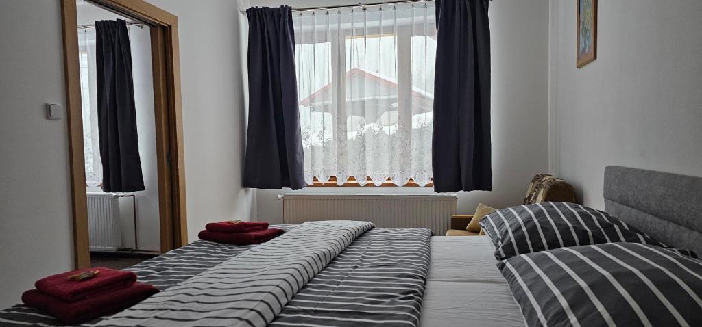 Postel nebo postele na pokoji v ubytování Apartment Ulrich