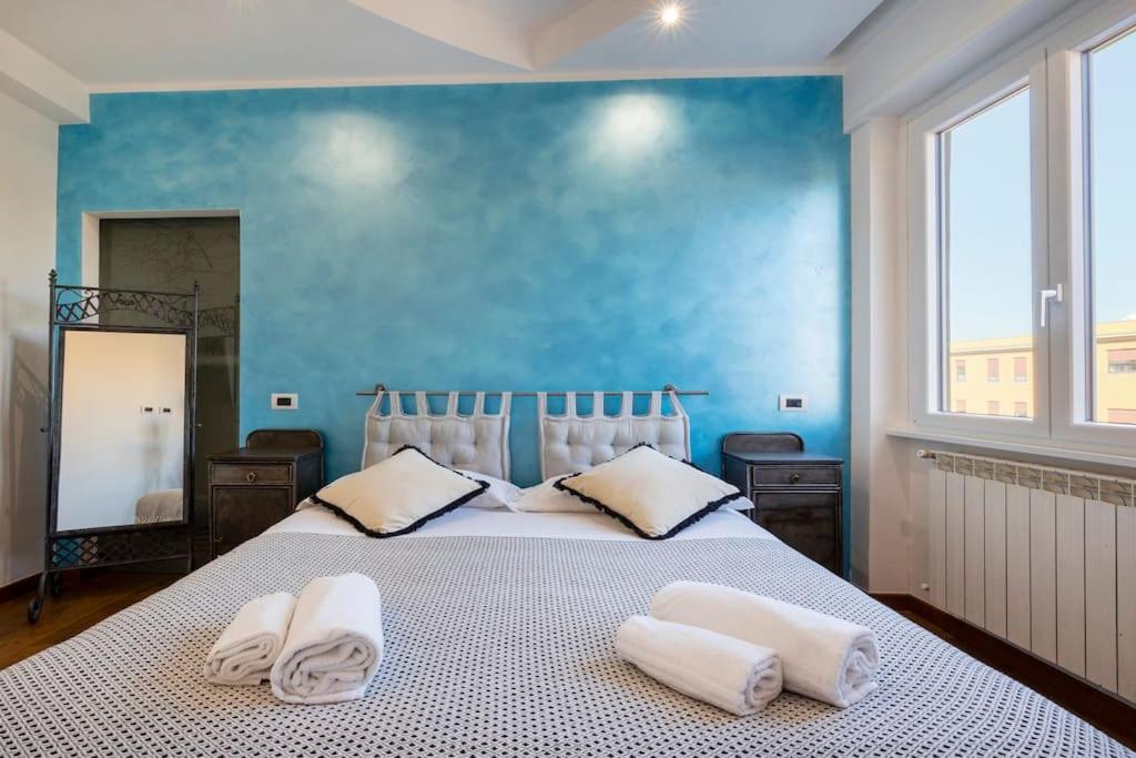 Stylish Apartment Rome tesisinde bir odada yatak veya yataklar