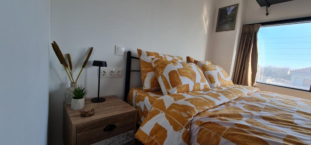 Postel nebo postele na pokoji v ubytování ΑΘΗΝΑ A7