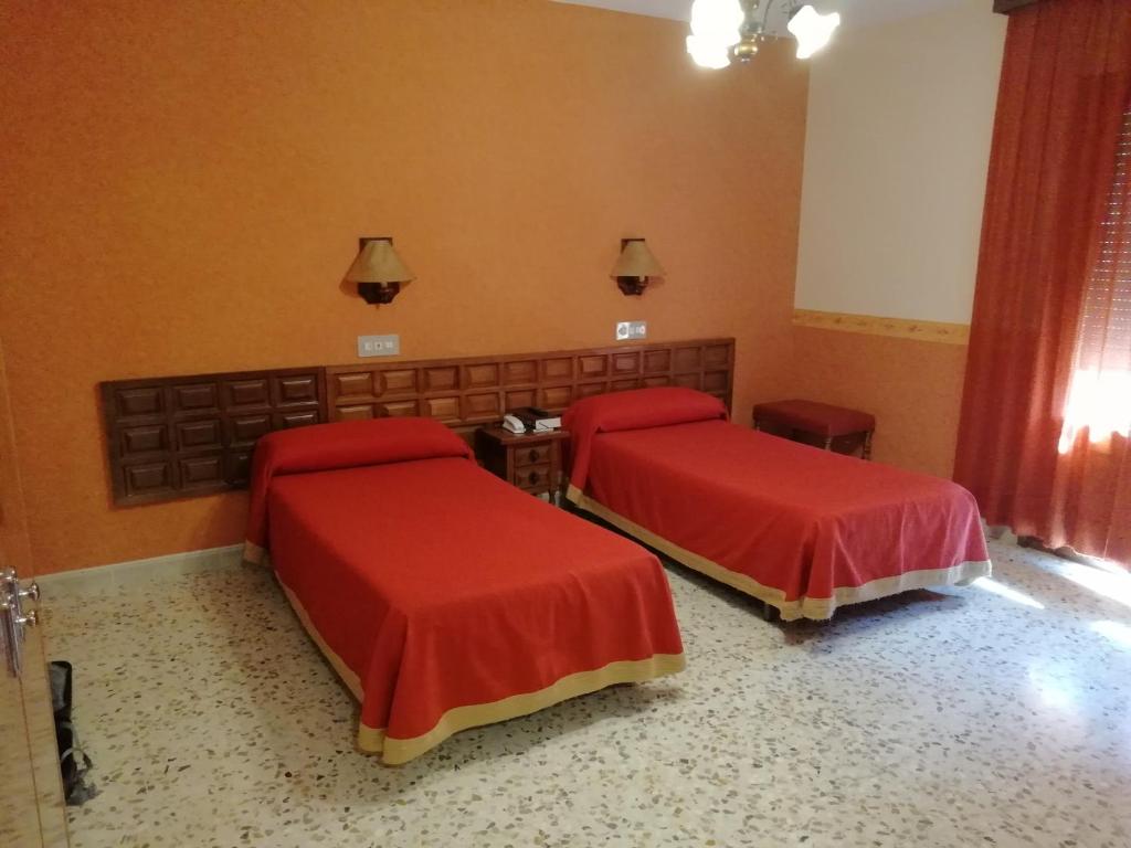 Postel nebo postele na pokoji v ubytování Hotel Latre