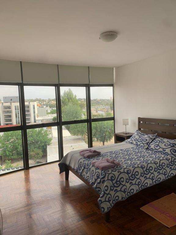 Ένα ή περισσότερα κρεβάτια σε δωμάτιο στο Departamento boutiques, centrico