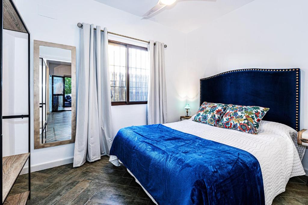 Кровать или кровати в номере Pandora House