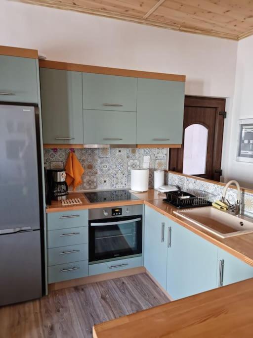 Kuchyň nebo kuchyňský kout v ubytování GS Home