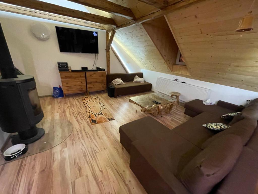 Posezení v ubytování Apartmany Pod Kloboukem