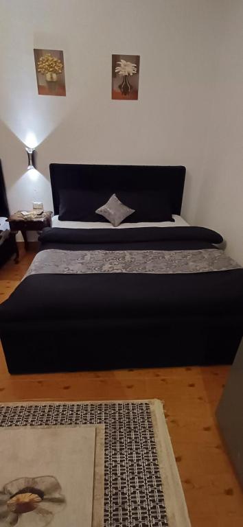 Postel nebo postele na pokoji v ubytování Yoya Hur Pyramids inn