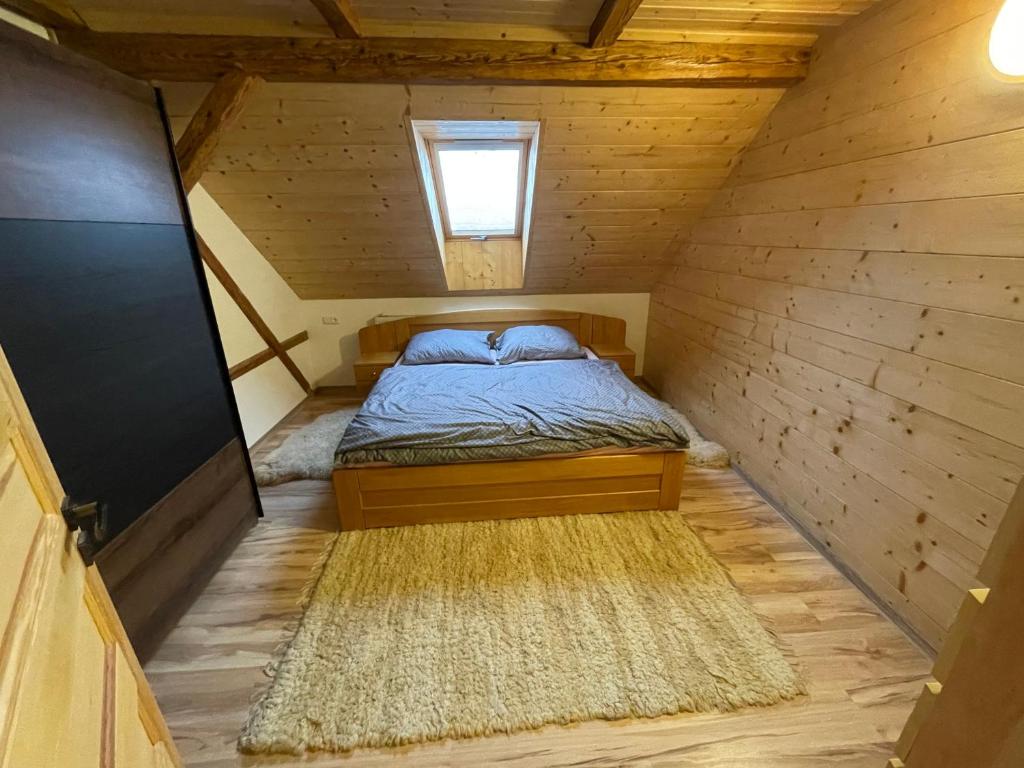 Postel nebo postele na pokoji v ubytování Apartmany Pod Kloboukem