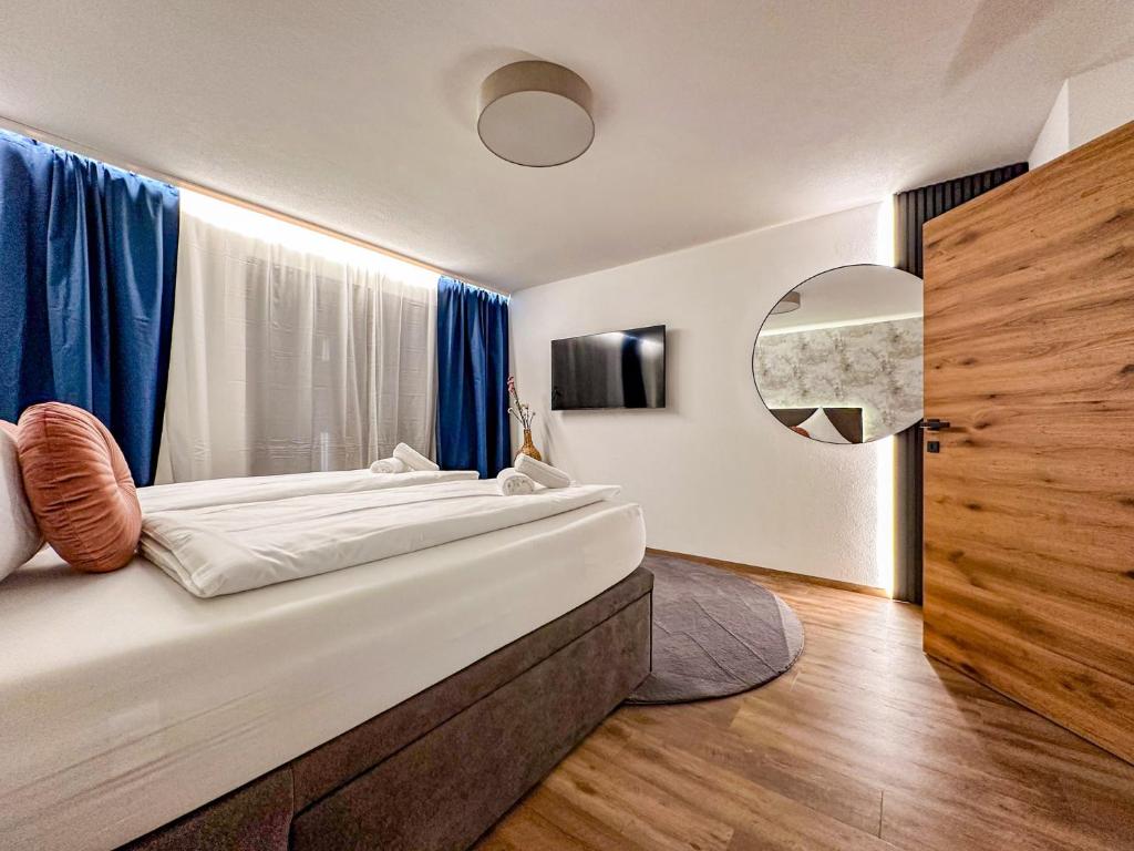 Postel nebo postele na pokoji v ubytování Zillertal Center Apartment Villa