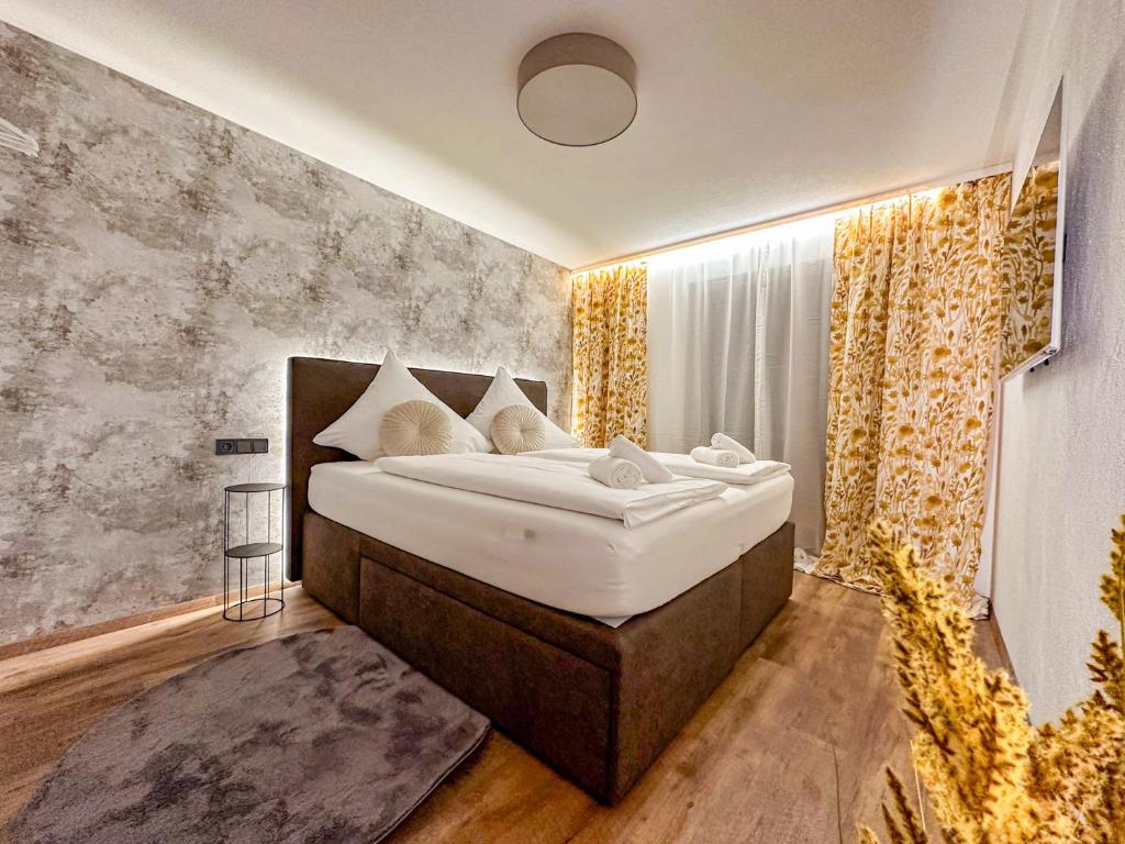 Postel nebo postele na pokoji v ubytování Zillertal Center Apartment Villa
