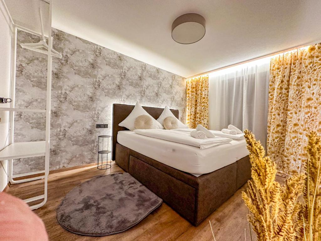Postel nebo postele na pokoji v ubytování Zillertal Center Apartment Villa