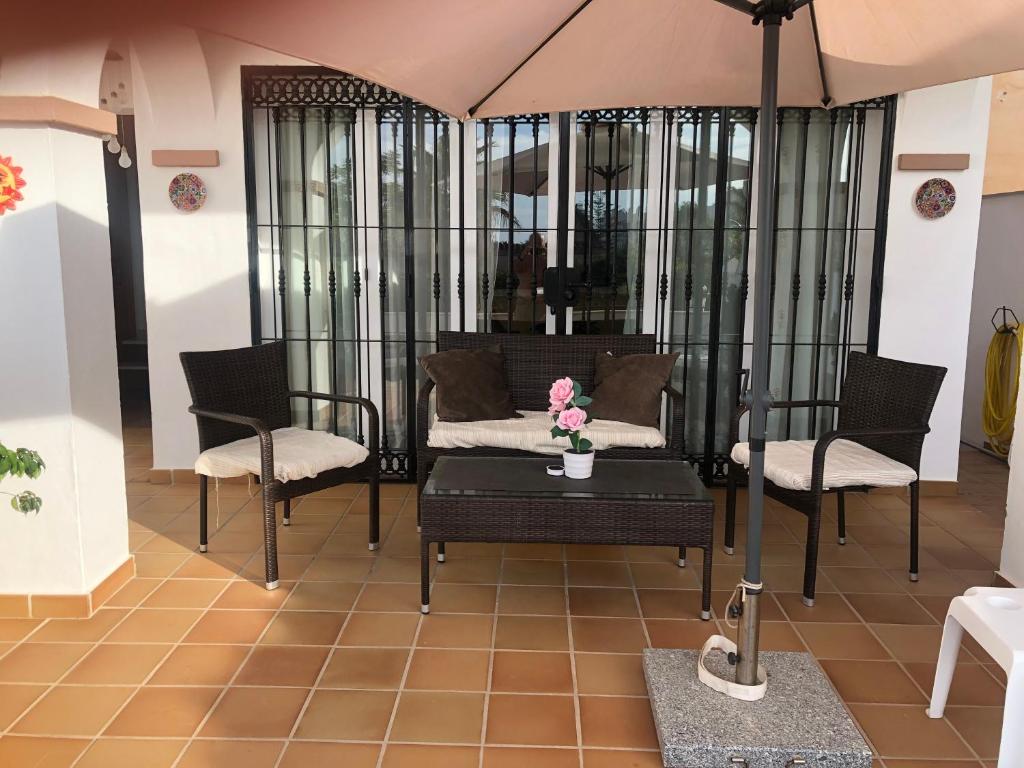 Posezení v ubytování Casa Rosi, vistas al mar, piscina privada y A/A