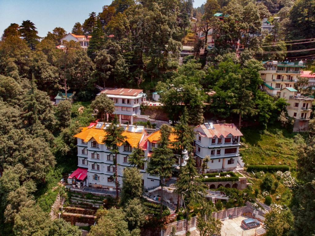 an aerial view of a house on a hill at Beyond Stay Lall Ji Tourist Resort in Dalhousie