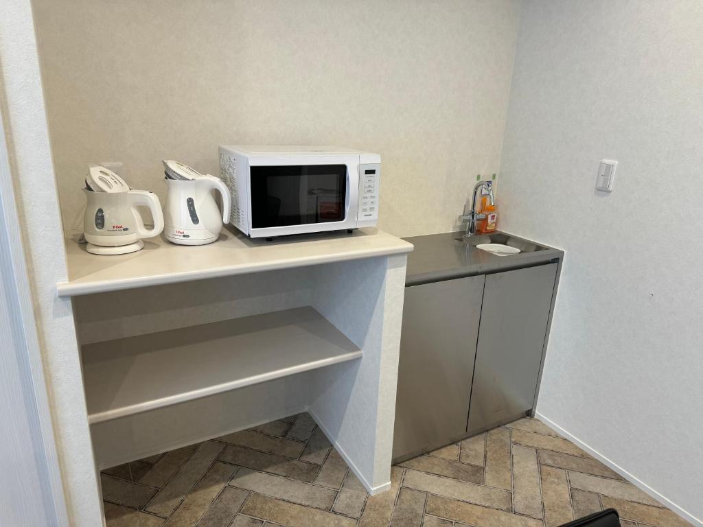 Kuchyň nebo kuchyňský kout v ubytování Hotel PRELE