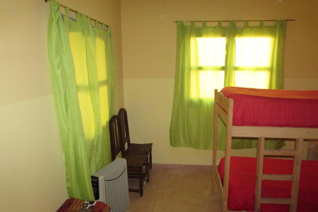 Postel nebo postele na pokoji v ubytování Hostel Céntro Belén