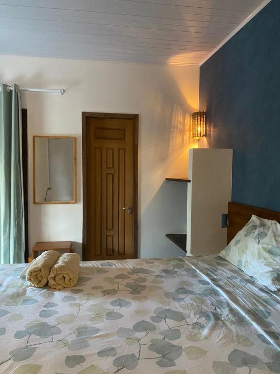 Postel nebo postele na pokoji v ubytování Estrela dos Lençóis