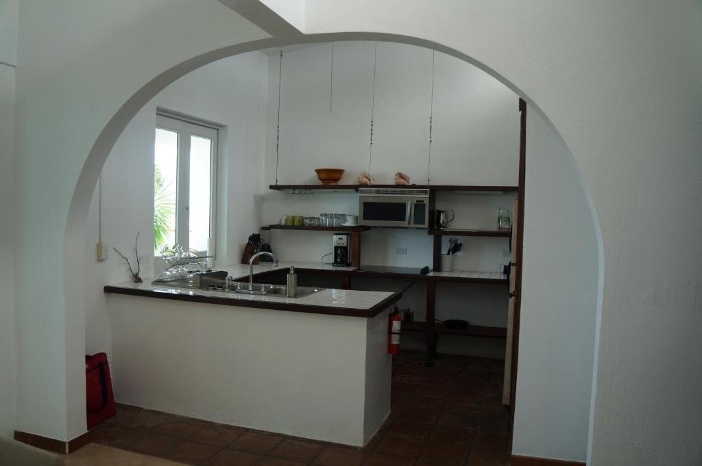 Kuchyň nebo kuchyňský kout v ubytování Bravo Beach Hotel