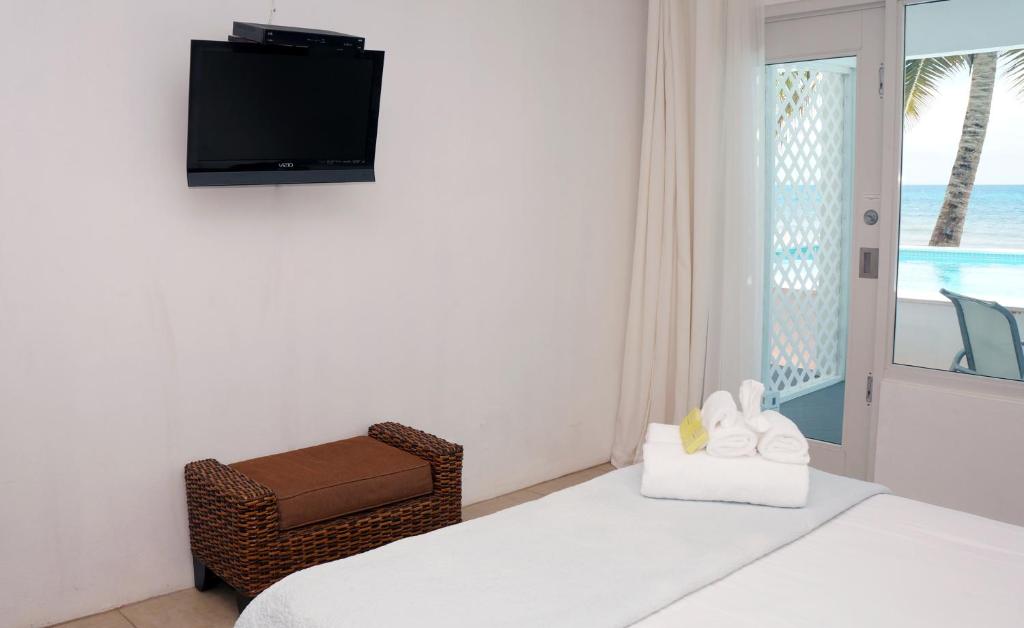 Postel nebo postele na pokoji v ubytování Bravo Beach Hotel