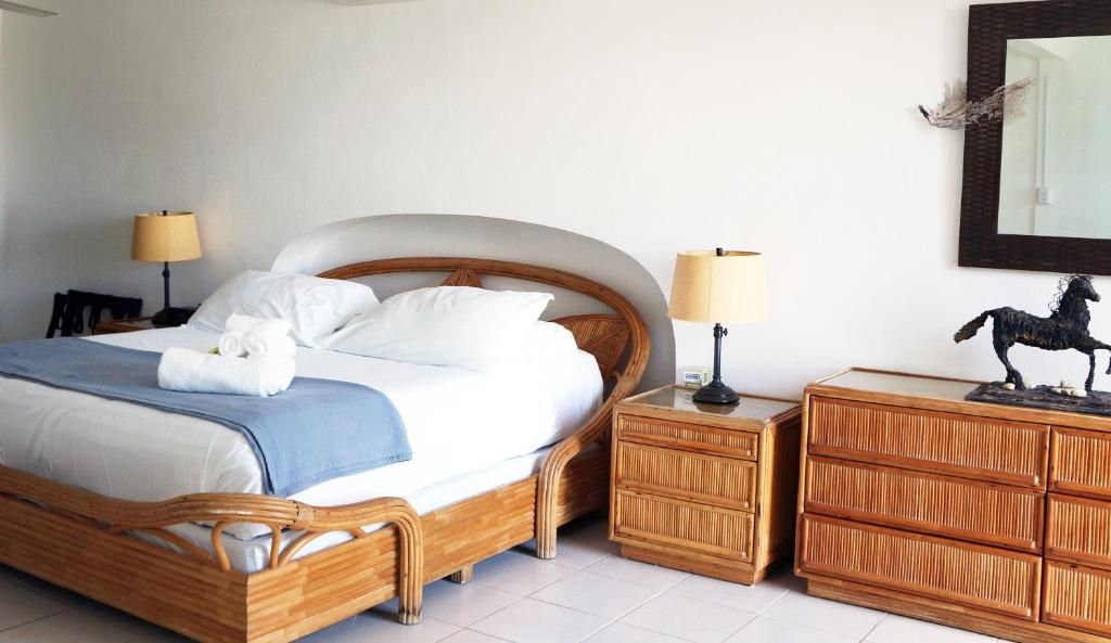 Postel nebo postele na pokoji v ubytování Bravo Beach Hotel