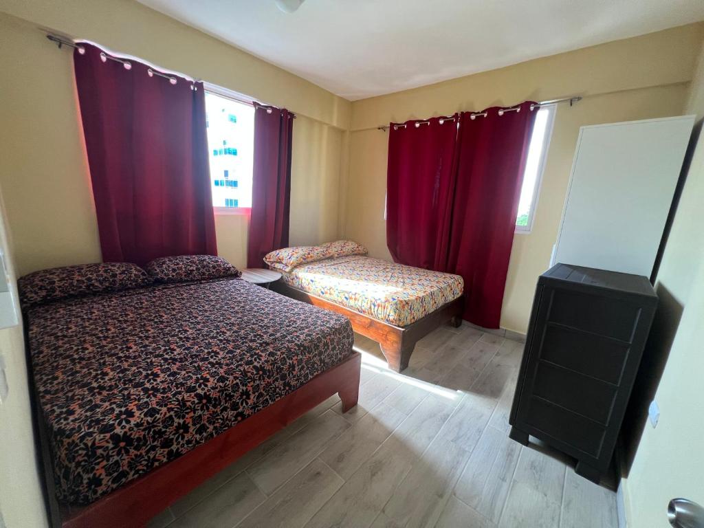 Postel nebo postele na pokoji v ubytování Plaza Real Resort