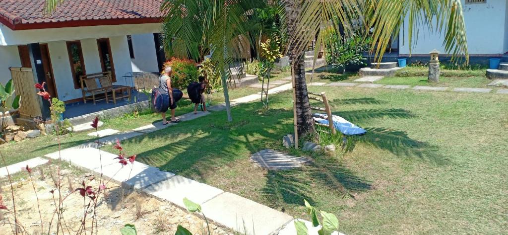 Dewi Garden Guesthouse - 12