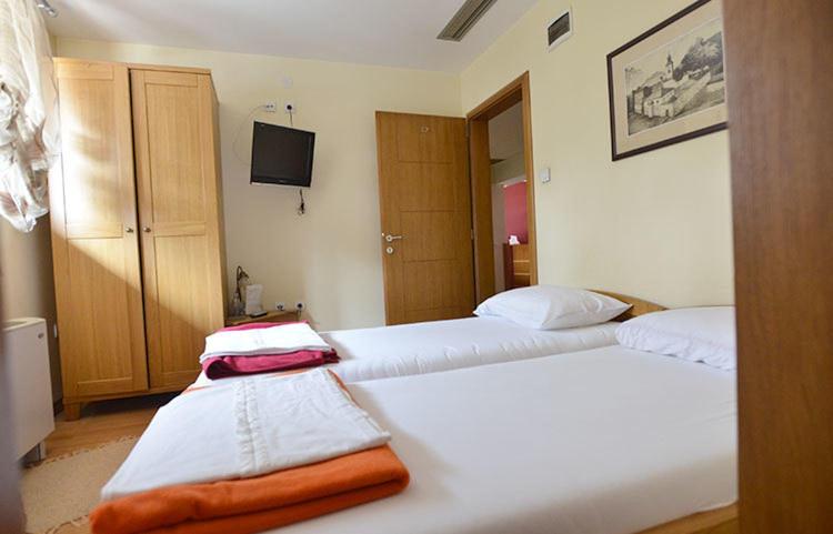 Postel nebo postele na pokoji v ubytování Motel Kneginja